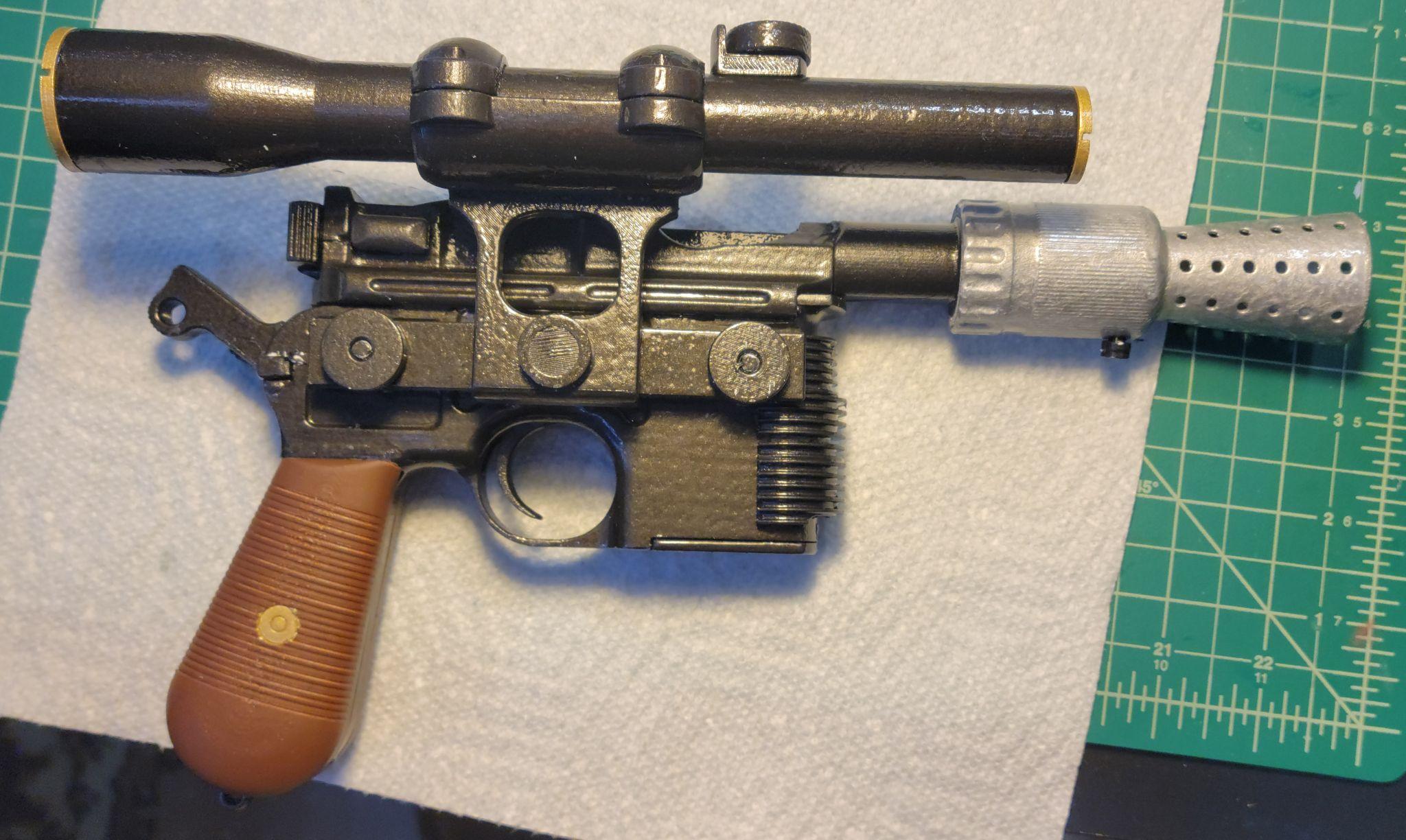 The finished DL-44 blaster after priming, painting, and final assembly