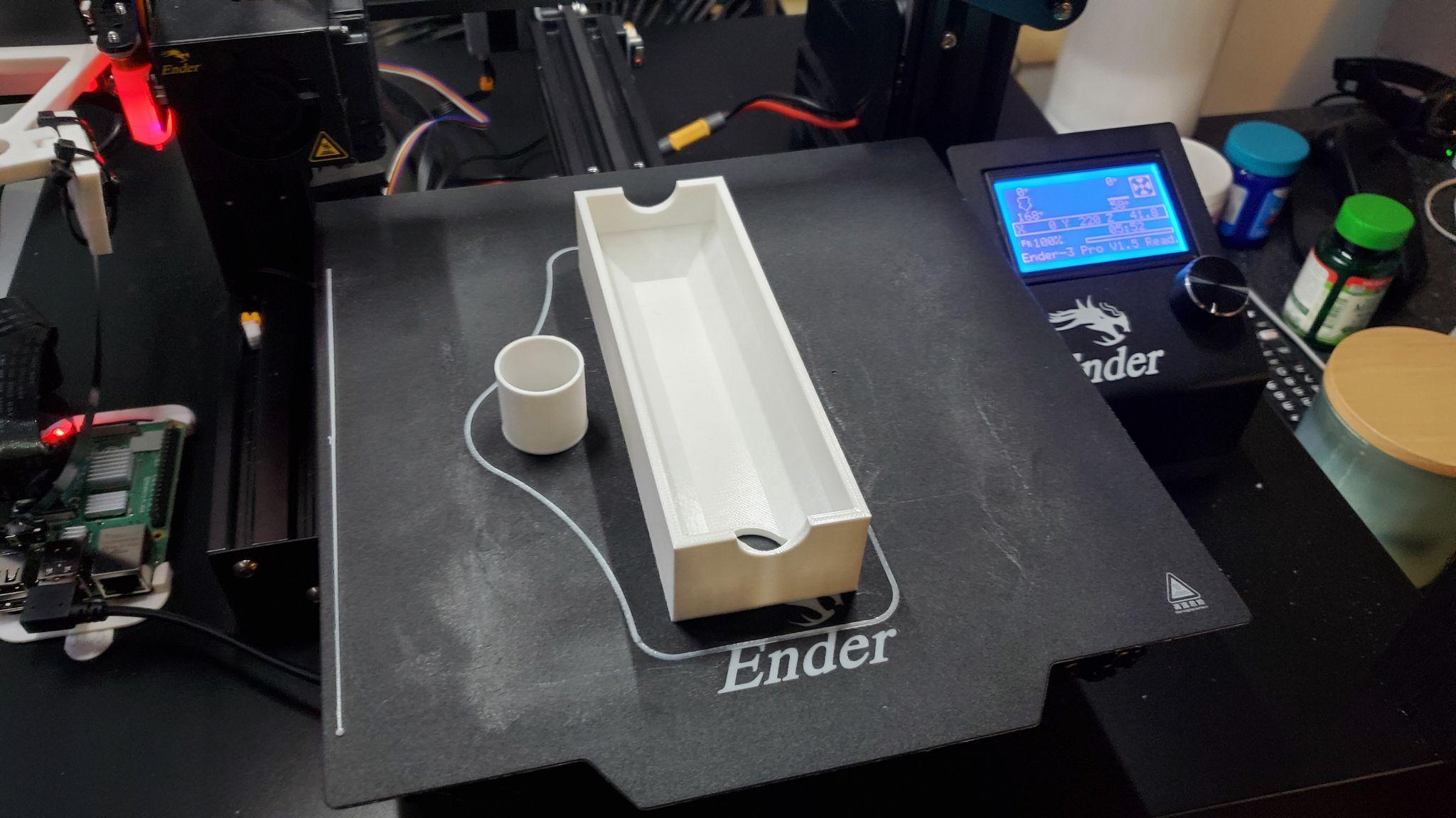 A functional drain printed to catch water from a leaky pipe — 3D printing solving a real practical problem