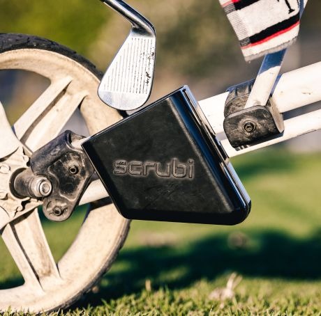 The Scrubi cleaner mounted and ready to go. A quick dip and scrub between shots keeps the grooves clean.