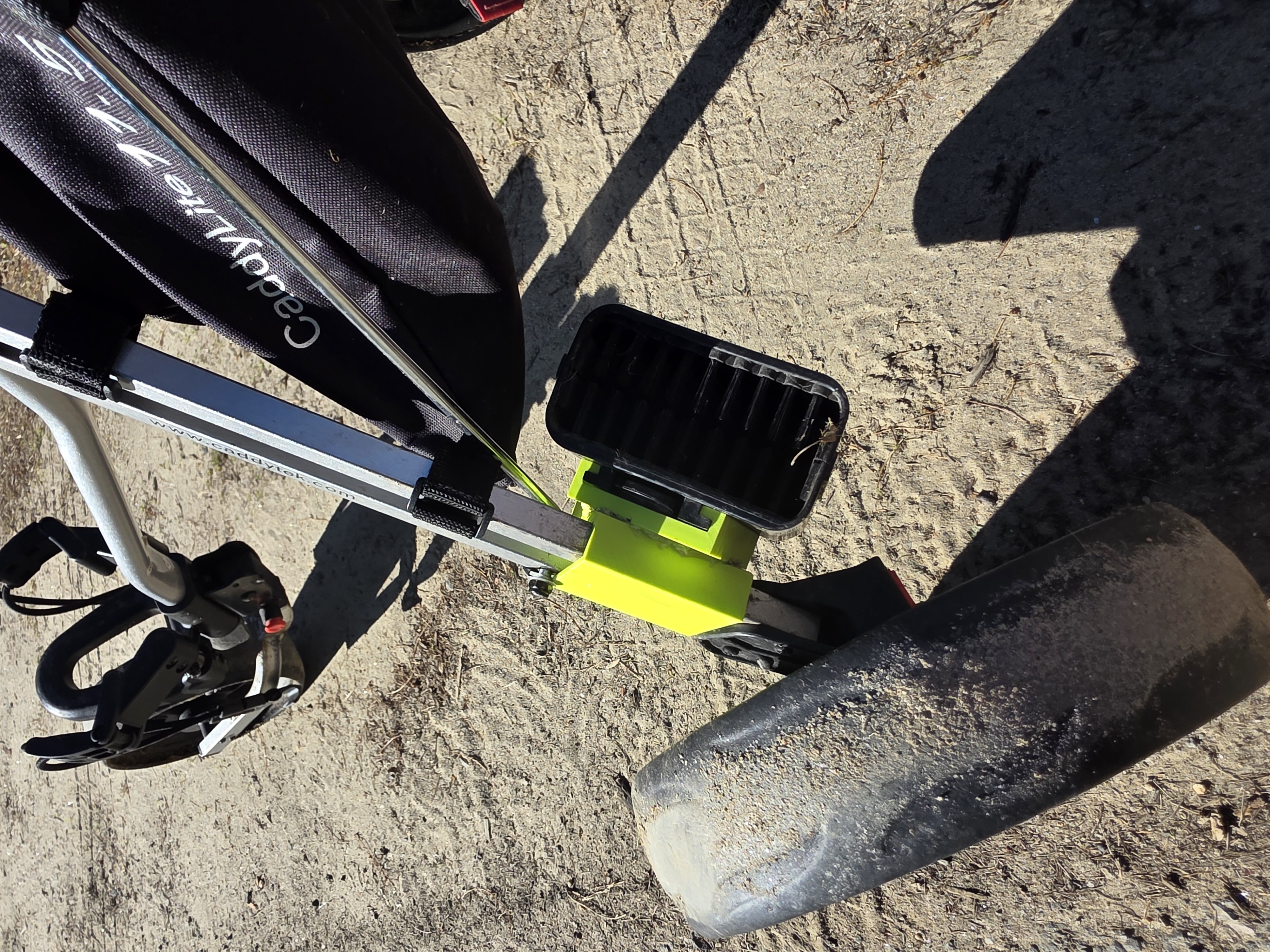 Installed on the CaddyLite 7.1.5 – front view showing the cleaner position relative to the wheel.